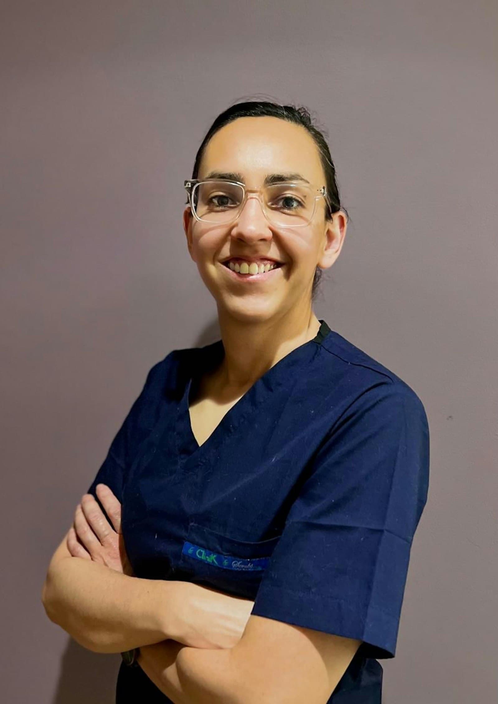 Nurse in scrubs at a hospital
